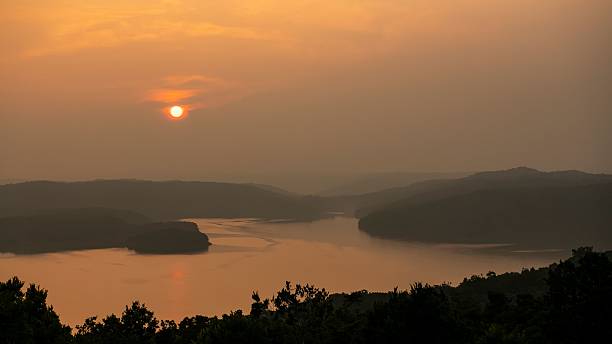 istock Serene sunset over tranquil lake and hills. 2232685264