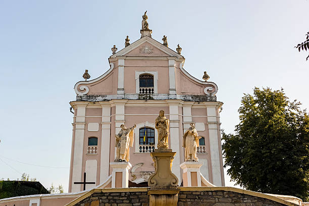 istock Historic architectural structure with ornate details and statues, showcasing cultural heritage and travel destination. Kamianets-Podilskyi, Ukraine 2232690699