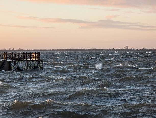 istock A Serene and Colorful Sunset Over Choppy Waters at a Pier 2232693451