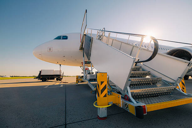 istock Boarding to airplane at airport 2232696025