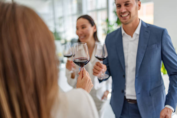istock Celebratory toast with coworkers in a modern office setting, marked by teamwork and professional achievements 2232708423