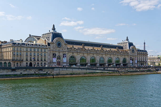 Paris, France. August 5, 2025 : the Orsay Museum view from Seine river