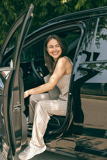 istock Young Woman Get In The Car 2232709688