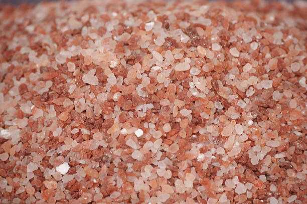 istock Himalayan pink salt close-up on a natural background 2232709755