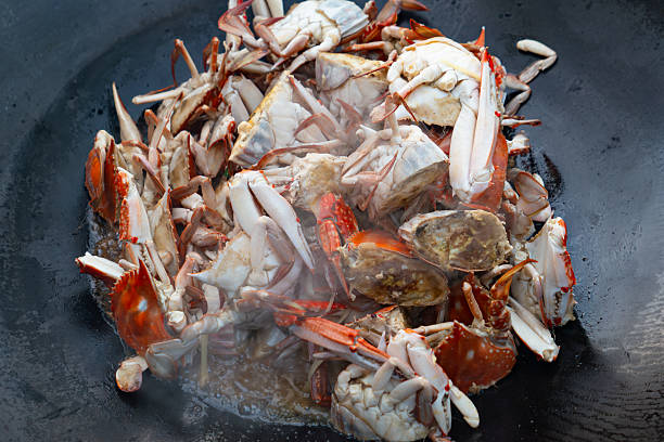 Closeup Live mud crabs served grilled and steamed on the tray.