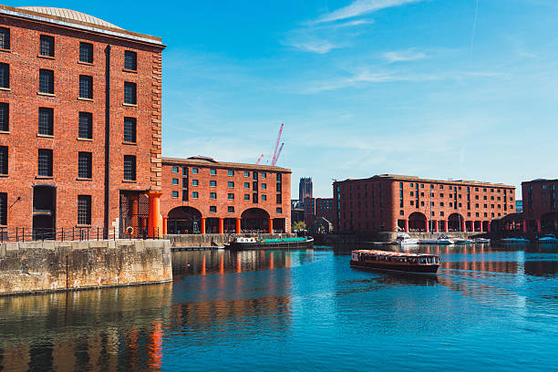 istock Ferry carrying tourists navigating albert dock in liverpool, england 2232715857