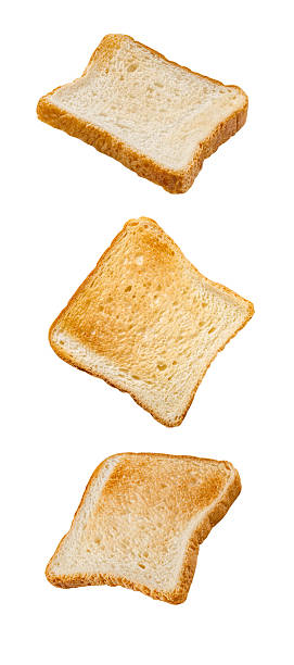 istock set of falling soaring flying baked bread toasts, isolated on white background 2232716033