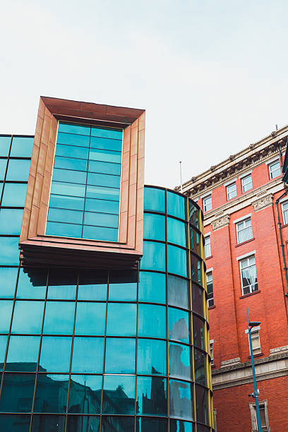 istock Modern glass building reflecting traditional architecture in liverpool 2232716122