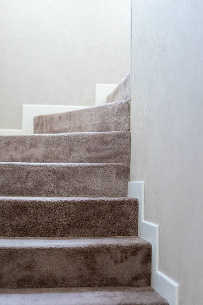 istock stairs at home with carpeting 2232718223