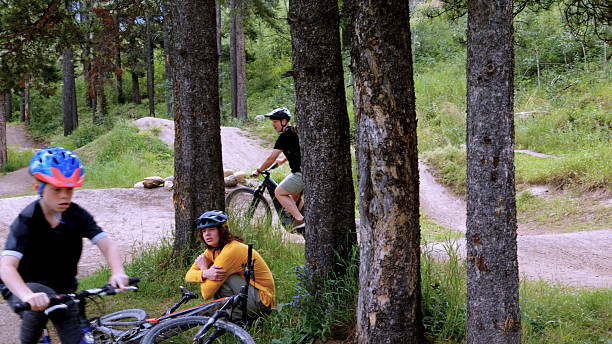istock Family with mountain bikes on pathway in forest 2232722276