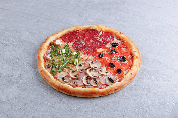 istock Mixed Topping Quarter Pizza with Pepperoni, Mushrooms, Olives and Greens 2232733607