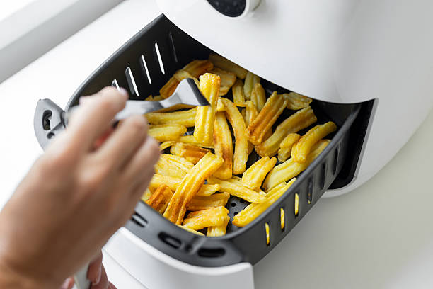 istock Preparing fried potatoes in the air fryer 2232735094