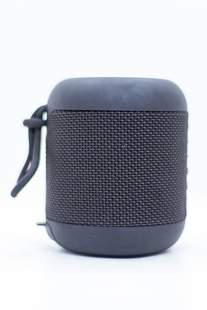 istock Black Portable Bluetooth Speaker with Fabric Mesh Cover on White Studio Background. 2232735402