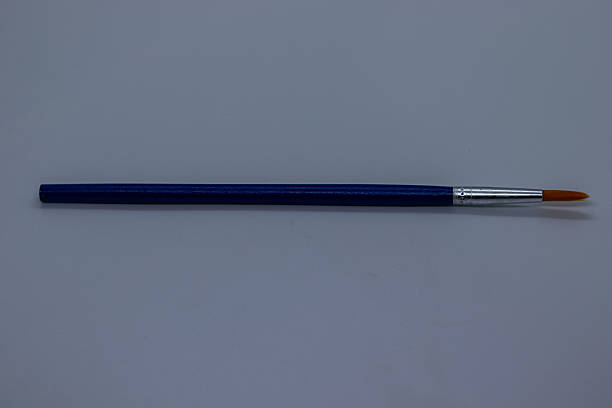 istock Bright Blue Wooden Paintbrush with Soft Bristles on White Background. 2232735477
