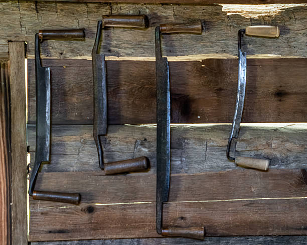 istock Old draw knives hanging in a work shed 2232735622