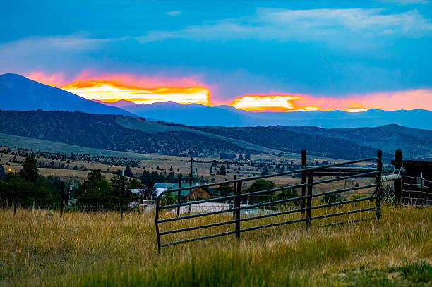istock Montana Mountains Across Valley Plains at Sunset 2232737060