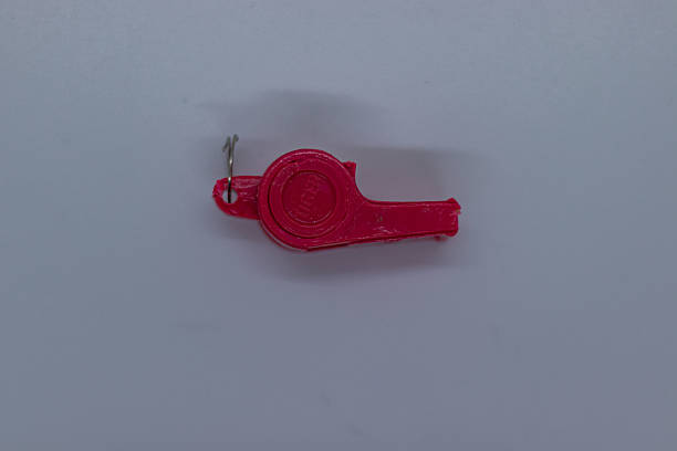 istock Compact and Vibrant Pink Whistle for Emergencies. 2232737161