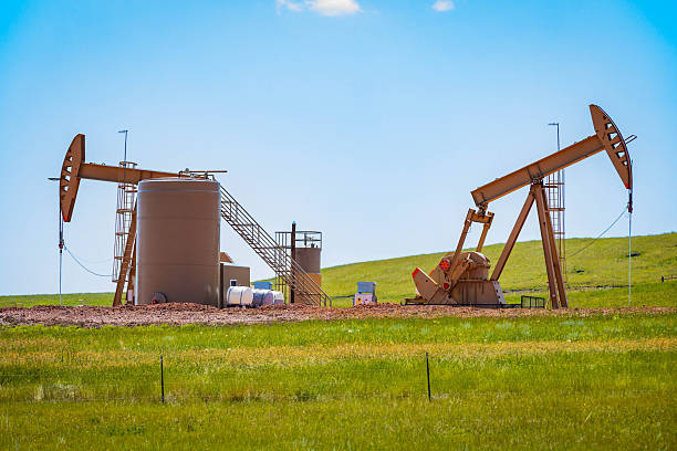 istock Active Pumpjack in an Oil Field 2232758036