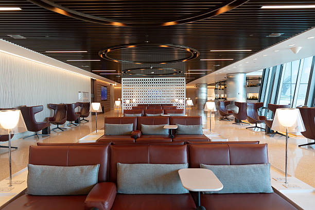 Doha, Qatar - October 18, 2024: seating area in Qatar Airways Silver Lounge at Hamad International Airport.