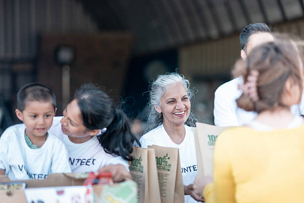 istock Community Volunteers Supporting a Donation Drive with Diverse Participants 2232762467