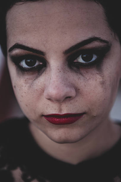 istock Dramatic female portrait with tears and red lipstick. 2232768656