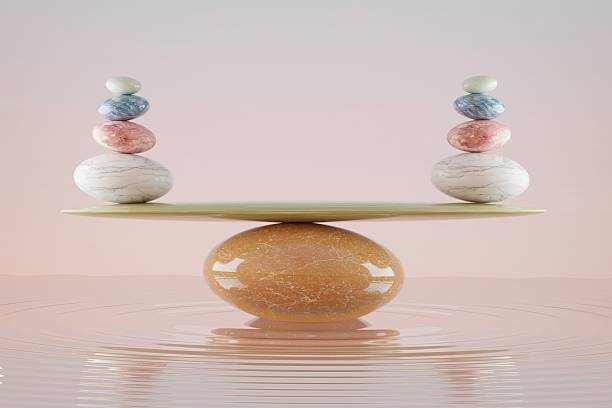 stone stacking marble stone sculpture, on rippled water