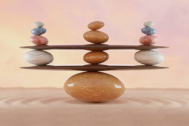 istock stone stacking marble stone sculpture, on pastel background 2232770027