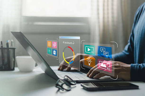 istock Businessman using laptop with AI assistant applications, futuristic digital interface, artificial intelligence technology for productivity, communication, data analysis and creative innovation. 2232771200