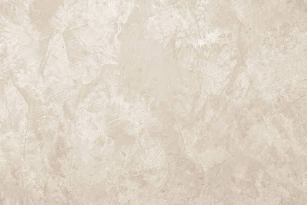 istock Colour old concrete wall texture background. Close up retro plain cream color cement wall background texture. Design paper vintage parchment element. 2232775305
