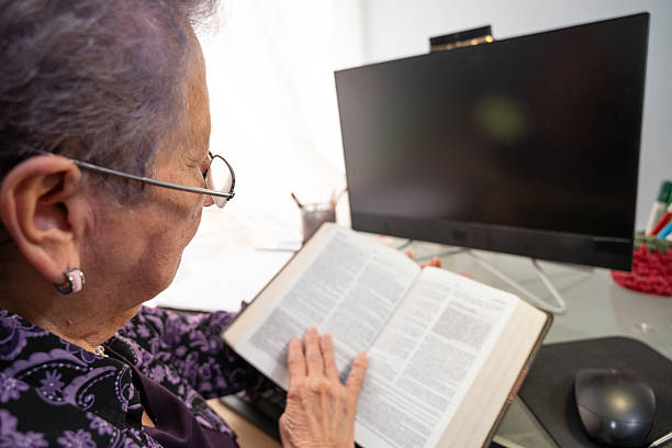 Faith-based psychologist referencing Bible in therapy planning