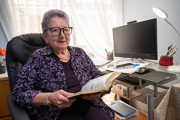 istock Christian therapist reading scripture in peaceful home office 2232781873