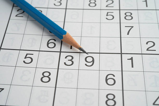 istock Sudoku puzzle, game to play for keep you brain younger for developing Alzheimer disease in senior patient. 2232783697