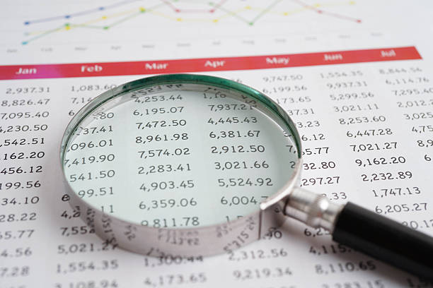 istock Magnifying glass on charts graphs paper. Financial development, Banking Account, Statistic, Investment Analytic research data economy. 2232783805