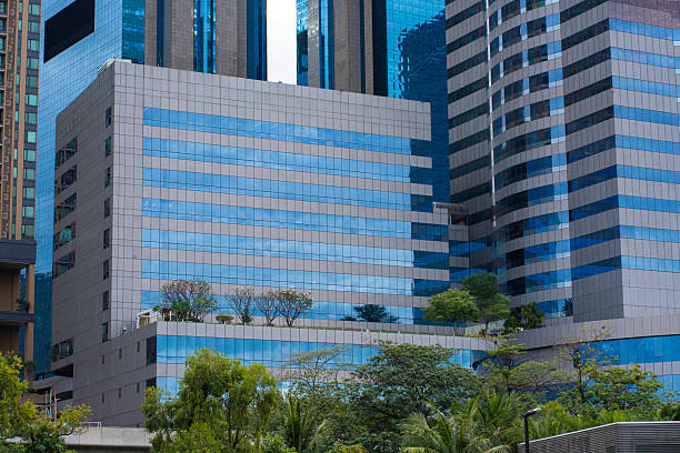istock Green city park with modern office building 2232784086