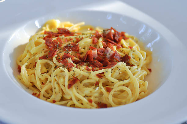 istock pasta carbonara ,spaghetti or spaghetti carbonara 2232785513