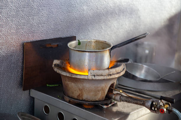 Utensil on fire. A kitchen work stock image of vessel while cooking in the kitchen. A pressure cooker on fire stock image. Utensil on fire. A kitchen work stock image of vessel while cooking in the kitchen. A pressure cooker on fire stock image. Utensil on fire. A kitchen work stock image of vessel while cooking in the kitchen. A pressure cooker on fire stock image. Utensil on fire. A kitchen work stock image of vessel while cooking in the kitchen. A pressure cooker on fire stock image. Utensil on fire. A kitchen work stock image of vessel while cooking in the kitchen. A pressure cooker on fire stock image.