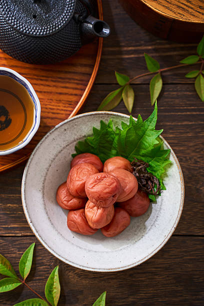 Japanese Umeboshi Pickled Plums in Ceramic Bowl with Shiso