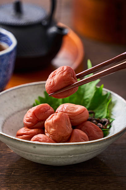 Japanese Umeboshi Pickled Plums in Ceramic Bowl with Shiso