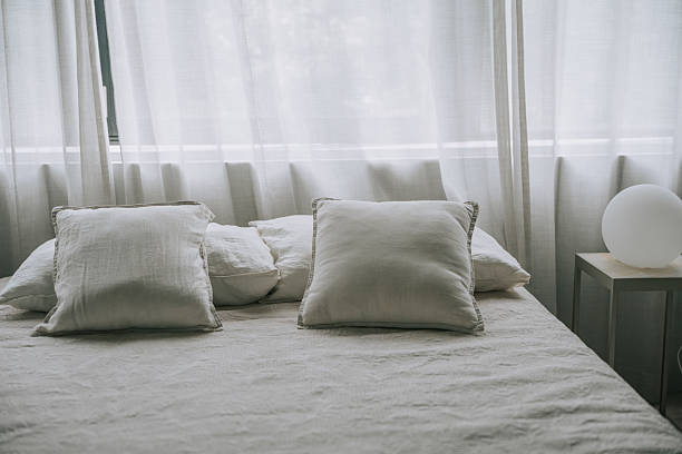 istock Minimalist bedroom interior with soft natural light 2232805152
