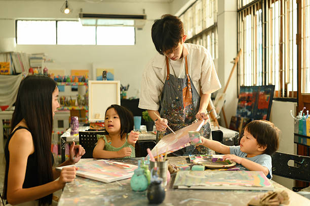 istock Creative Learning in Preschool Art Class with Teacher and Family Interaction 2232806081