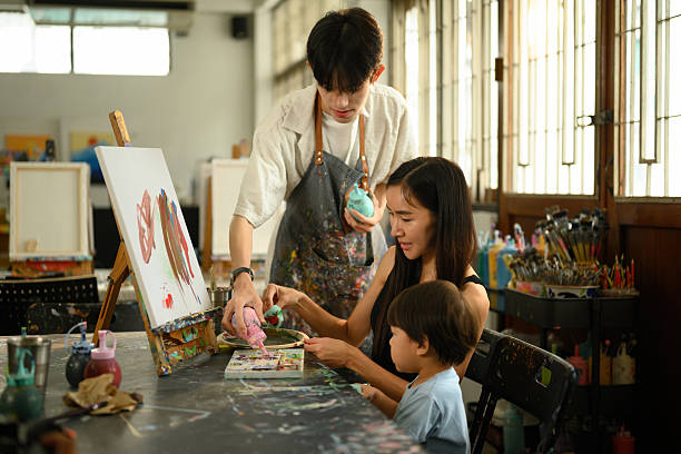 istock An Art Instructor Guiding Parent and Child in Preschool Class 2232806141