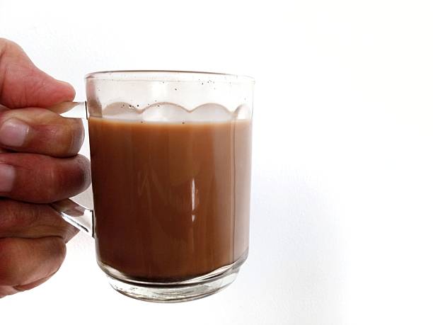 istock Hand pose holding a glass of coffee 2232806803