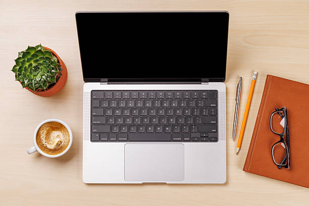 istock A clean and minimal desk setup featuring a laptop and a coffee cup 2232808169