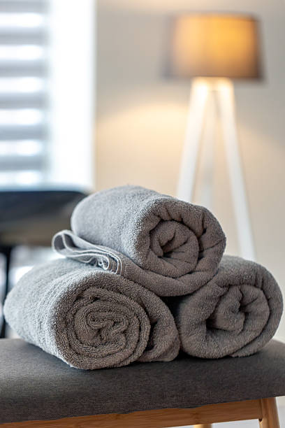 istock Gray spa towels on table. Minimal cozy mood 2232815539