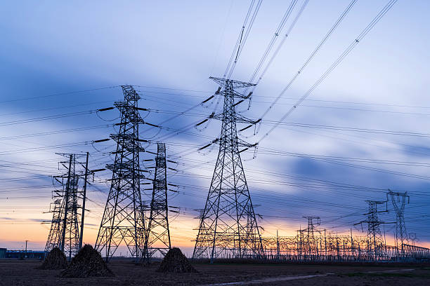 istock Pylons, high voltage pylons in the evening 2232815779