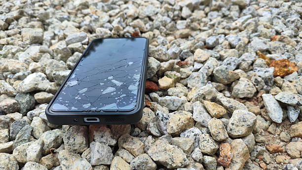 istock Dropped and Damaged Phone on Rough Surface 2232816212