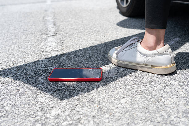 istock Phone Dropped on the Roadside 2232816237