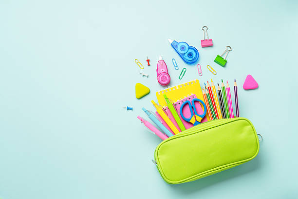 istock Pencil case with stationery on blue background. 2232824957