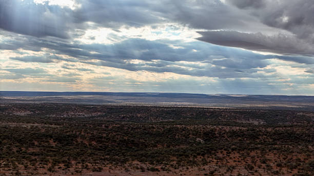 istock Sunlight breaking through the clouds over the outback arid landscape in South Australia 2232831346