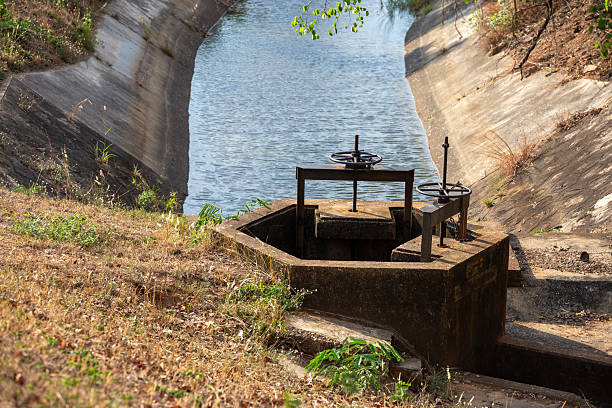 The ancient water gate of the old and rusted irrigation system